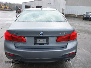 2018 BMW 5 Series 540i xDrive with VIN WBAJE7C52JWC57407, listed as a IAAI auction lot 41805890 with 112,151 mi miles and . Bid and sale history available at DreamBid. Image 16.