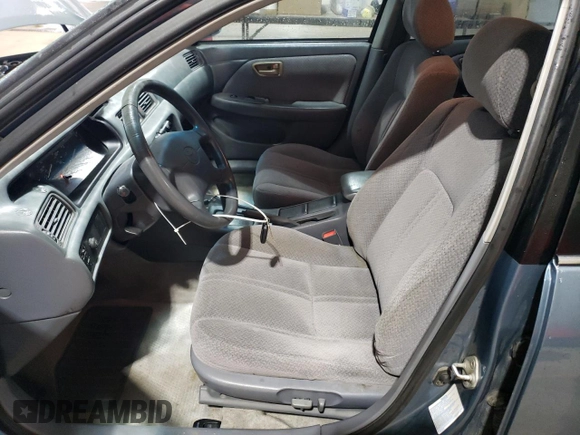 2000 Toyota Camry CE z VIN 4T1BG22K7YU744080, wystawiony jako Copart lot #56675105 z przebiegiem 226 154 mil mil oraz Szkoda całkowita • Salvage title. Historia ofert i sprzedaży dostępna na DreamBid. Obrazek 7.