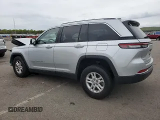 2023 Jeep Grand Cherokee Altitude with VIN 1C4RJHAG8P8850873, listed as a Copart auction lot 56918625 with 23,323 mi miles and Salvage title. Bid and sale history available at DreamBid. Image 2.