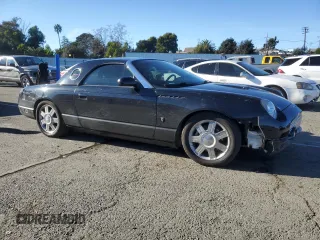 2004 Ford Thunderbird Deluxe with VIN 1FAHP60A94Y105675, listed as a Copart auction lot 87677015 with 91,154 mi miles and Salvage Title. Bid and sale history available at DreamBid. Image 4.
