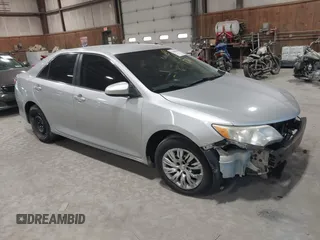 2012 Toyota Camry L z VIN 4T4BF1FK6CR164017, wystawiony jako IAAI lot #42060678 z przebiegiem 257 314 mil mil oraz . Historia ofert i sprzedaży dostępna na DreamBid. Obrazek 1.