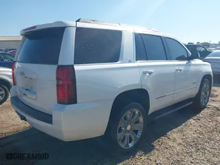 2020 Chevrolet Tahoe LT with VIN 1GNSCBKC9LR196546, listed as a IAAI auction lot 41661308 with 132,714 mi miles. Bid and sale history available at carsss.com. Image 4.