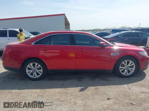 2011 Ford Taurus SEL z VIN 1FAHP2EW7BG123740, wystawiony jako IAAI lot #41890761 z przebiegiem 132 310 mil mil oraz . Historia ofert i sprzedaży dostępna na DreamBid. Obrazek 14.