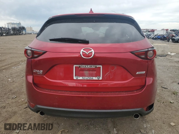 2019 Mazda CX-5 Grand Touring z VIN JM3KFBDM2K0665993, wystawiony jako Copart lot #58440685 z przebiegiem 38 306 mil mil oraz Szkoda całkowita • Salvage title. Historia ofert i sprzedaży dostępna na DreamBid. Obrazek 6.