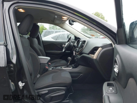 2016 Jeep Cherokee Latitude with VIN 1C4PJMCBXGW112540, listed as a IAAI auction lot 42336449 with 94,774 mi miles and . Bid and sale history available at DreamBid. Image 5.