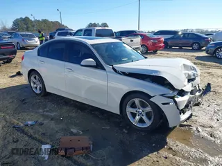2013 BMW 3 Series 328i with VIN WBA3C1G55DNR49447, listed as a IAAI auction lot 41296098 with 126,605 mi miles. Bid and sale history available at carsss.com. Image 1.