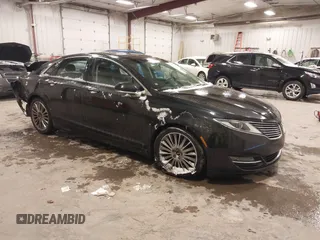 2013 Lincoln MKZ z VIN 3LN6L2GK1DR817922, wystawiony jako IAAI lot #41315599 z przebiegiem 89 463 mil mil oraz . Historia ofert i sprzedaży dostępna na DreamBid. Obrazek 1.