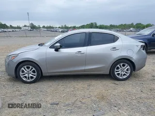 2016 Scion iA z VIN 3MYDLBZV5GY144289, wystawiony jako IAAI lot #42247688 z przebiegiem 107 958 mil mil oraz . Historia ofert i sprzedaży dostępna na DreamBid. Obrazek 14.
