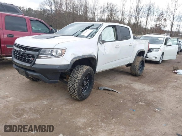 2018 Chevrolet Colorado 4WD ZR2 with VIN 1GCGTEEN3J1295176, listed as a IAAI auction lot 41418943 with 57,621 mi miles. Bid and sale history available at carsss.com. Image 2.