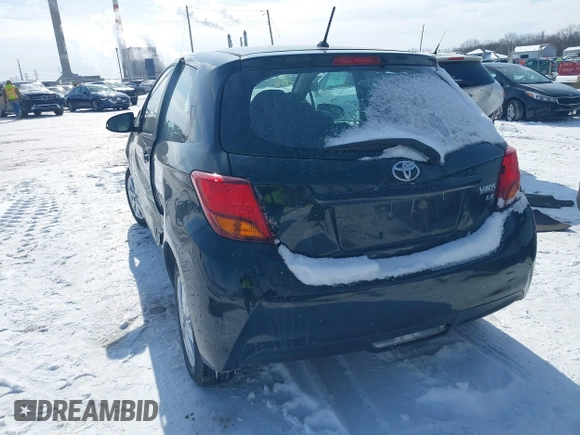 2015 Toyota Yaris L with VIN VNKJTUD34FA055116, listed as a IAAI auction lot 41601874 with 84,508 mi miles. Bid and sale history available at carsss.com. Image 3.