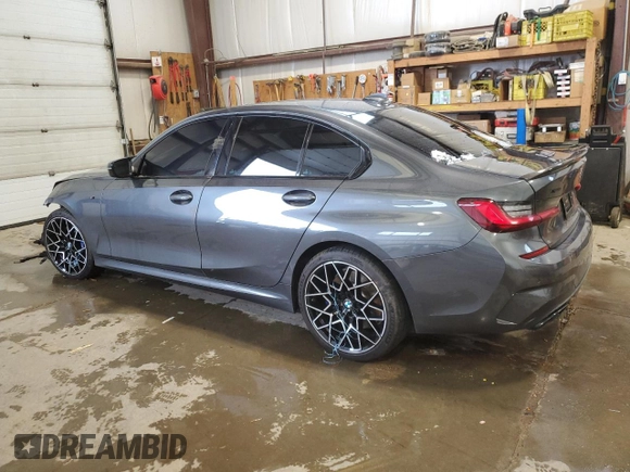2022 BMW 3 Series M340i xDrive with VIN WBA5U9C02NFL66019, listed as a Copart auction lot 86330044 with 42,394 mi miles and Salvage Title. Bid and sale history available at DreamBid. Image 2.