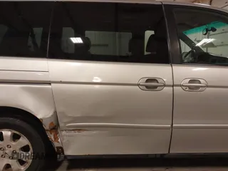 2004 Honda Odyssey EX-L with VIN 5FNRL18974B127696, listed as a IAAI auction lot 41643243 with 200,286 mi miles and . Bid and sale history available at DreamBid. Image 6.