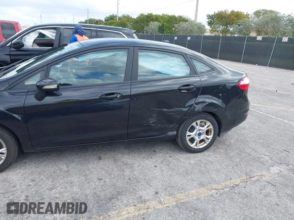 2015 Ford Fiesta SE with VIN 3FADP4BJ5FM130099, listed as a IAAI auction lot 42126960 with 82,299 mi miles and . Bid and sale history available at DreamBid. Image 6.