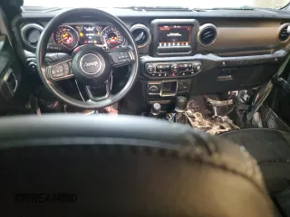 2023 Jeep Wrangler Sport with VIN 1C4HJXDN8PW639488, listed as a Copart auction lot 44931555 with 23,371 mi miles and Salvage Title. Bid and sale history available at DreamBid. Image 8.