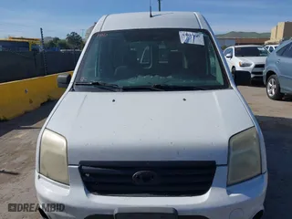 2010 Ford Transit Connect XLT with VIN NM0LS6BN3AT031811, listed as a IAAI auction lot 42085017 with 208,169 mi miles. Bid and sale history available at carsss.com. Image 6.