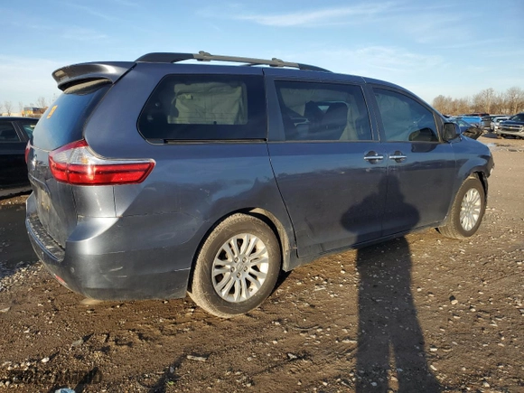2015 Toyota Sienna XLE with VIN 5TDYK3DC8FS654883, listed as a Copart auction lot 84719274 with 0 mi miles and Salvage Title. Bid and sale history available at carsss.com. Image 3.