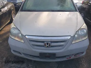 2005 Honda Odyssey EX-L with VIN 5FNRL38635B415153, listed as a IAAI auction lot 41912526 with 211,445 mi miles. Bid and sale history available at carsss.com. Image 6.