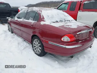 2003 Jaguar X-Type 2.5L Manual z VIN SAJEA51D63XC89273, wystawiony jako IAAI lot #41298544 z przebiegiem 124 400 mil mil oraz . Historia ofert i sprzedaży dostępna na DreamBid. Obrazek 3.