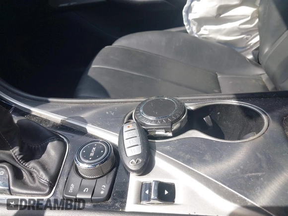 2019 Infiniti Q60 Luxe with VIN JN1EV7EL7KM290268, listed as a IAAI auction lot 42331261 with 95,402 mi miles and . Bid and sale history available at DreamBid. Image 11.