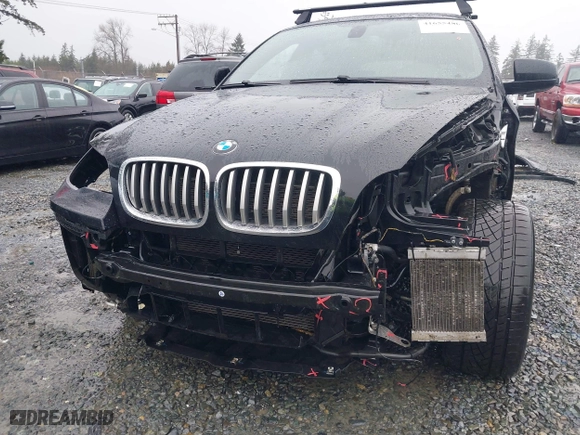 2014 BMW X6 50i with VIN 5UXFG8C57EL593257, listed as a IAAI auction lot 41655486 with 128,292 mi miles. Bid and sale history available at carsss.com. Image 6.