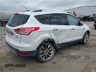 2016 Ford Escape SE with VIN 1FMCU0GX0GUA95789, listed as a IAAI auction lot 41829818 with 84,431 mi miles. Bid and sale history available at carsss.com. Image 4.