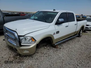 2015 Ram 2500 Longhorn with VIN 3C6UR5GL8FG574099, listed as a Copart auction lot 62744584 with 251,179 mi miles and Salvage title. Bid and sale history available at DreamBid. Image 1.