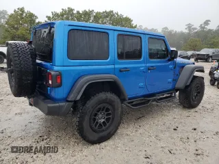2023 Jeep Wrangler Sport S with VIN 1C4HJXDGXPW692324, listed as a Copart auction lot 41761235 with 15,660 mi miles and Salvage Title. Bid and sale history available at DreamBid. Image 3.