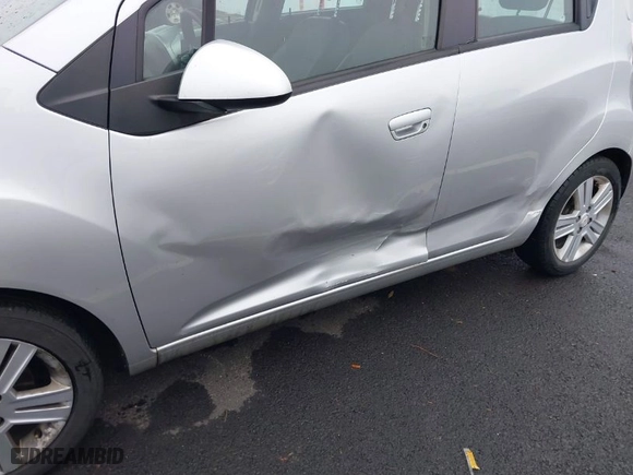 2015 Chevrolet Spark LS with VIN KL8CA6S99FC744012, listed as a IAAI auction lot 41009398 with 137,716 mi miles. Bid and sale history available at carsss.com. Image 6.