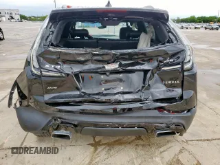 2020 Cadillac XT4 AWD Sport z VIN 1GYFZFR40LF019359, wystawiony jako Copart lot #55651105 z przebiegiem 57 531 mil mil oraz Szkoda całkowita • Salvage title. Historia ofert i sprzedaży dostępna na DreamBid. Obrazek 6.