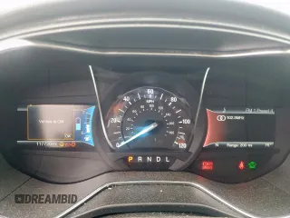 2017 Ford Fusion Hybrid Titanium with VIN 3FA6P0RU7HR388521, listed as a Copart auction lot 57318895 with 117,720 mi miles and Salvage title. Bid and sale history available at DreamBid. Image 9.