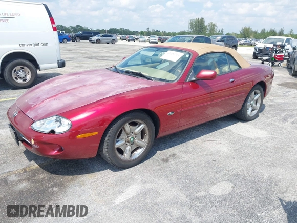 1997 Jaguar XK with VIN SAJGX2743VC017588, listed as a IAAI auction lot 42055716 with 66,052 mi miles and . Bid and sale history available at DreamBid. Image 2.