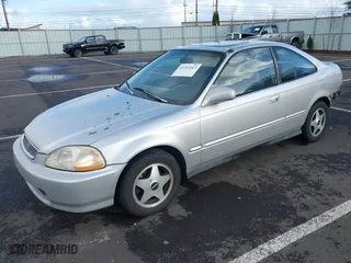 1998 Honda Civic EX with VIN 1HGEJ8249WL047196, listed as a IAAI auction lot 41713267 with 116,274 mi miles. Bid and sale history available at carsss.com. Image 2.