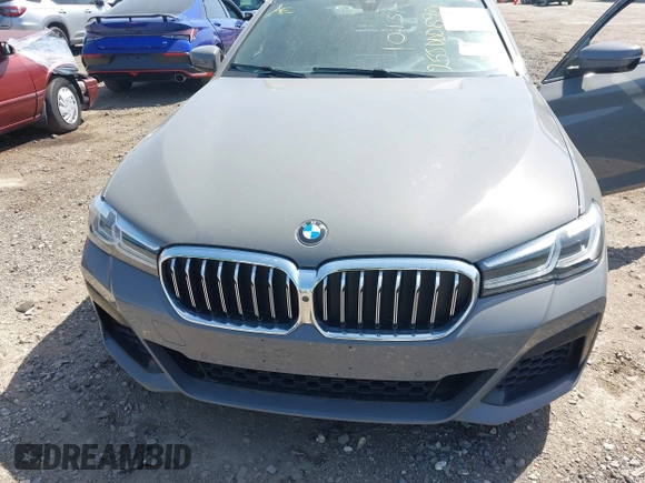 2021 BMW 5 Series 540i xDrive with VIN WBA73BJ03MWX30307, listed as a IAAI auction lot 41891615 with 27,374 mi miles and . Bid and sale history available at DreamBid. Image 6.