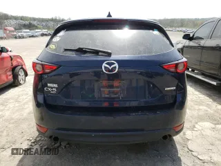 2020 Mazda CX-5 Grand Touring with VIN JM3KFBDM0L0767634, listed as a Copart auction lot 54433935 with 57,901 mi miles and Salvage Title. Bid and sale history available at carsss.com. Image 6.