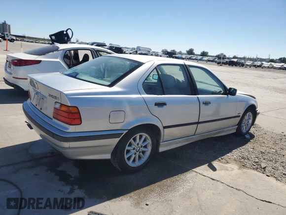 1998 BMW 3 Series 328iA with VIN WBACD4326WAV64466, listed as a Copart auction lot 74957534 with 152,963 mi miles and Salvage Title. Bid and sale history available at carsss.com. Image 3.