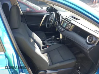 2018 Toyota RAV4 LE with VIN JTMBFREV3JJ253566, listed as a IAAI auction lot 41978107 with 49,729 mi miles. Bid and sale history available at carsss.com. Image 5.