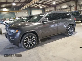 2017 Jeep Grand Cherokee Overland with VIN 1C4RJFCT1HC755486, listed as a Copart auction lot 54852525 with 122,193 mi miles and Salvage title. Bid and sale history available at DreamBid. Image 1.