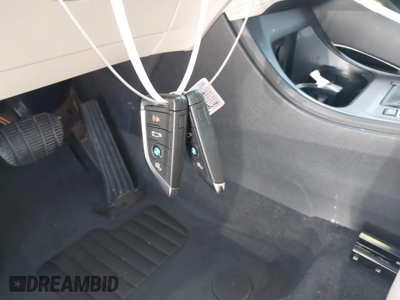 2021 BMW X1 sDrive28i with VIN WBXJG7C07M3M65841, listed as a IAAI auction lot 41877032 with 79,817 mi miles and . Bid and sale history available at DreamBid. Image 11.