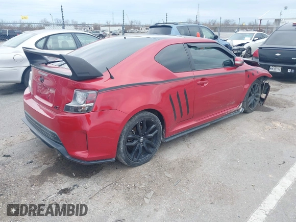 2016 Scion tC with VIN JTKJF5C74GJ026588, listed as a IAAI auction lot 41582253 with 74,023 mi miles. Bid and sale history available at carsss.com. Image 4.