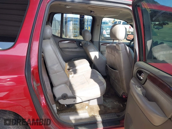 2005 GMC Envoy SLT z VIN 1GKET16SX56163372, wystawiony jako IAAI lot #42256243 z przebiegiem 238 853 mil mil oraz . Historia ofert i sprzedaży dostępna na DreamBid. Obrazek 8.