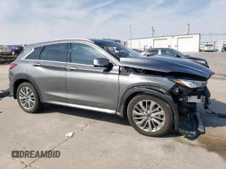 2023 Infiniti QX50 Luxe with VIN 3PCAJ5BA3PF105275, listed as a Copart auction lot 50584265 with 26,399 mi miles and Salvage title. Bid and sale history available at DreamBid. Image 4.