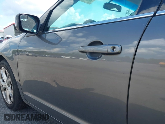 2012 Ford Fusion SE with VIN 3FAHP0HA0CR102548, listed as a IAAI auction lot 42628344 with 166,597 mi miles and . Bid and sale history available at DreamBid. Image 13.