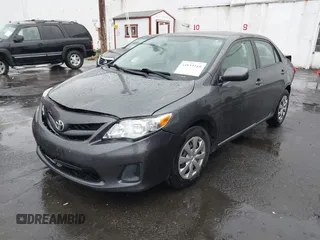 2011 Toyota Corolla L with VIN 2T1BU4EE4BC643260, listed as a IAAI auction lot 41833210 with 218,062 mi miles. Bid and sale history available at carsss.com. Image 2.