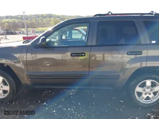 2006 Jeep Grand Cherokee Laredo with VIN 1J4GR48K56C326847, listed as a IAAI auction lot 41972623 with 141,088 mi miles. Bid and sale history available at carsss.com. Image 15.
