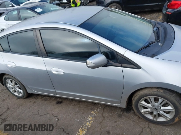 2010 Honda Insight EX with VIN JHMZE2H77AS022538, listed as a IAAI auction lot 41804579 with 184,000 mi miles and . Bid and sale history available at DreamBid. Image 12.