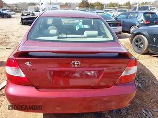 2002 Toyota Camry XLE z VIN 4T1BF32K02U006928, wystawiony jako IAAI lot #41569825 z przebiegiem 188 482 mil mil oraz . Historia ofert i sprzedaży dostępna na DreamBid. Obrazek 15.