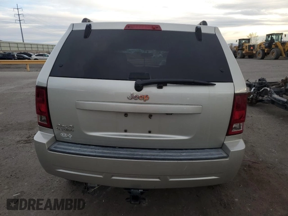 2010 Jeep Grand Cherokee Laredo with VIN 1J4PR4GK8AC111117, listed as a Copart auction lot 48947915 with 152,293 mi miles and Salvage Title. Bid and sale history available at carsss.com. Image 6.