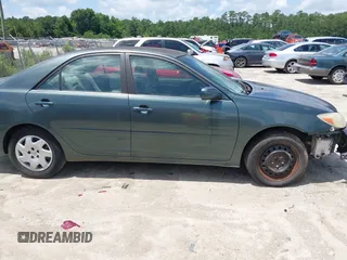 2002 Toyota Camry LE z VIN JTDBE32K720040038, wystawiony jako IAAI lot #42442332 z przebiegiem 147 278 mil mil oraz . Historia ofert i sprzedaży dostępna na DreamBid. Obrazek 1.