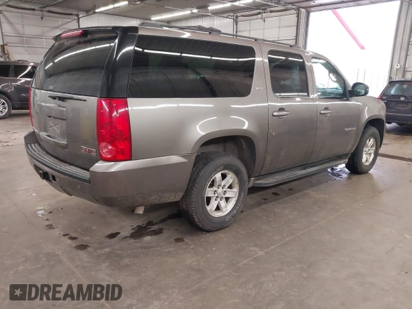 2013 GMC Yukon XL SLT with VIN 1GKS2KE71DR213758, listed as a IAAI auction lot 41713240 with 193,611 mi miles. Bid and sale history available at carsss.com. Image 4.