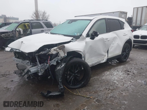 2024 Mazda CX-5 2.5 Carbon Turbo with VIN JM3KFBAY4R0521878, listed as a IAAI auction lot 41511893 with 1 mi miles. Bid and sale history available at carsss.com. Image 2.